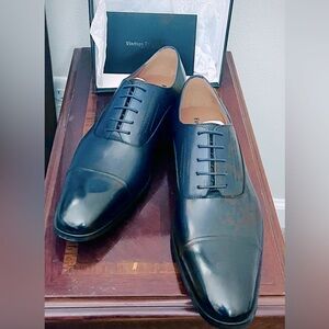 Classic Navy Men's Dress Shoes. New, never worn with tags and original box.